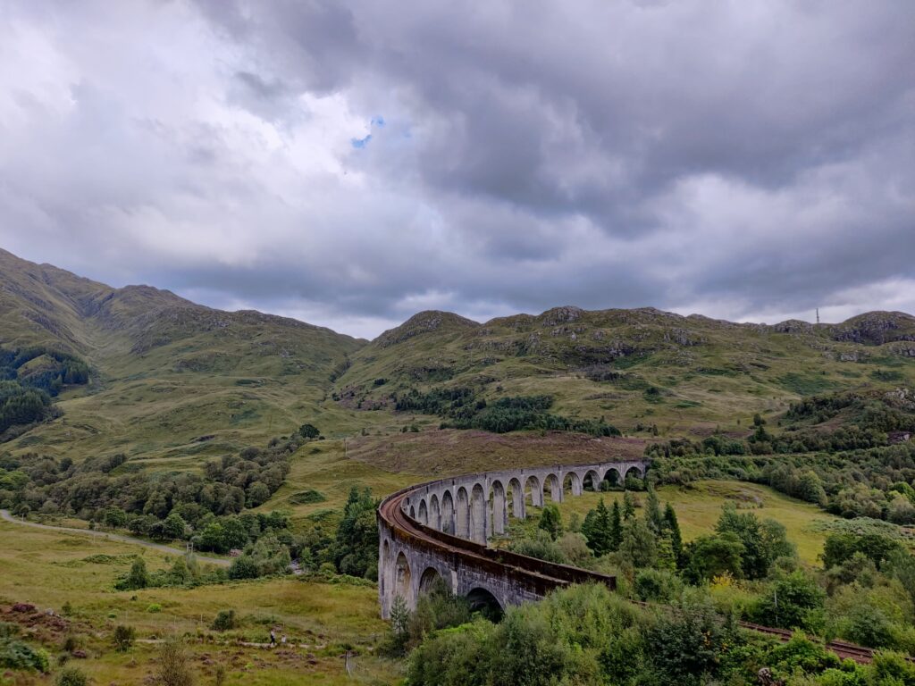Looking towards the Glenfinnan Bridge from the Glenfinnan Viaduct viewpoint. From here you can see the Hogwarts Express cross the famous "Harry Potter Railway Bridge"