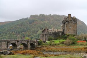 Visit Eilean Donan Castle - view from across the loch