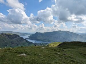 Hiking Helvellyn via Striding Edge the views over Ullswater at the start of the hike