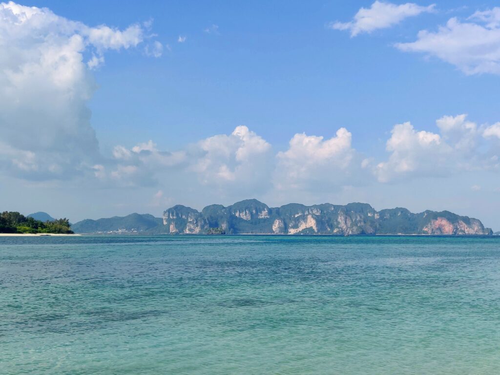 Best beaches in Krabi - the view of the limestone cliffs from Tup Island towards Krabi