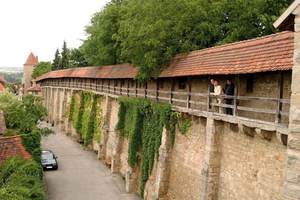 things to do in Rothenburg ob der Tauber include exploring the old town walls above the town